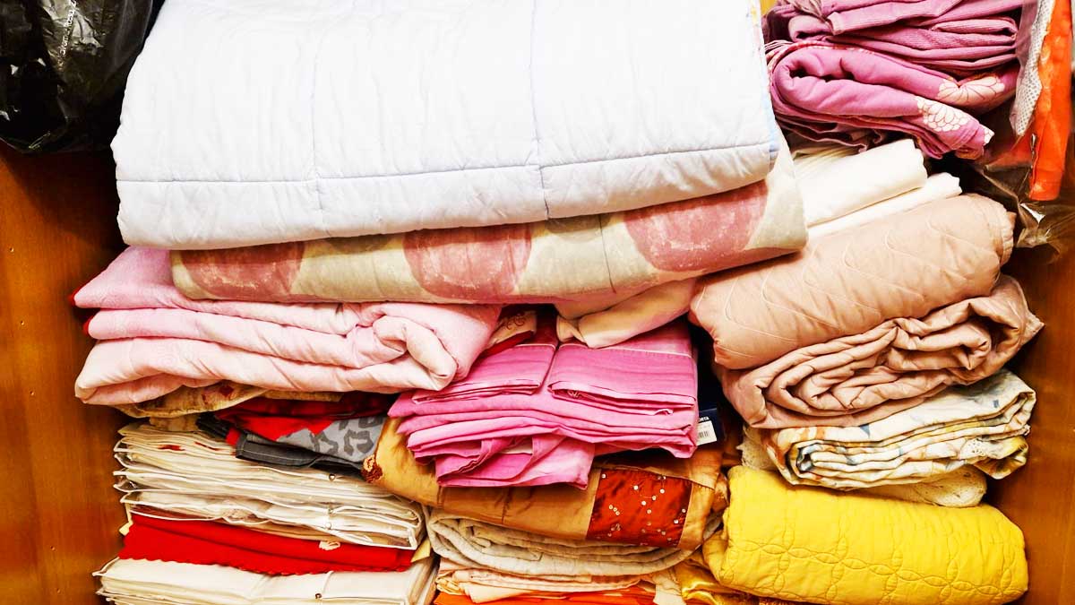 Come sistemare le Coperte nell’Armadio per risparmiare spazio